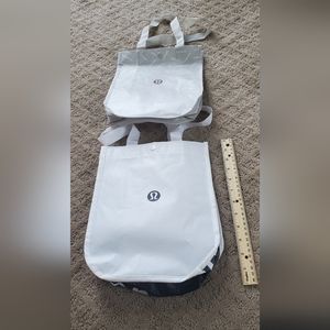 2 lululemon shopping bags, used once to bring product home